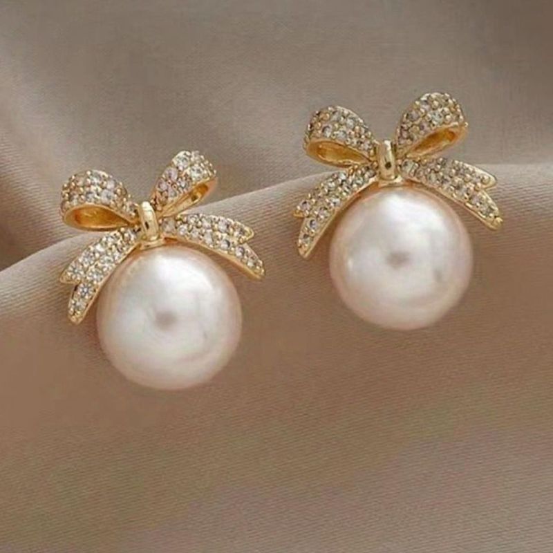 BOW PEARL STUDS